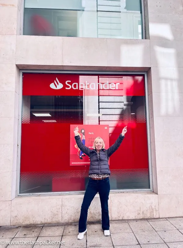 Solo Travel in Spain: Best Destinations & Practical Guide 5 Solo traveller pointing at a Santander city sign in northern Spain